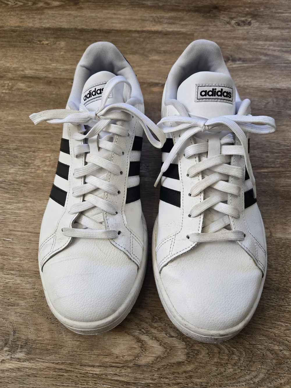 adidas Men’s White Sneakers with Black Three-Stripes